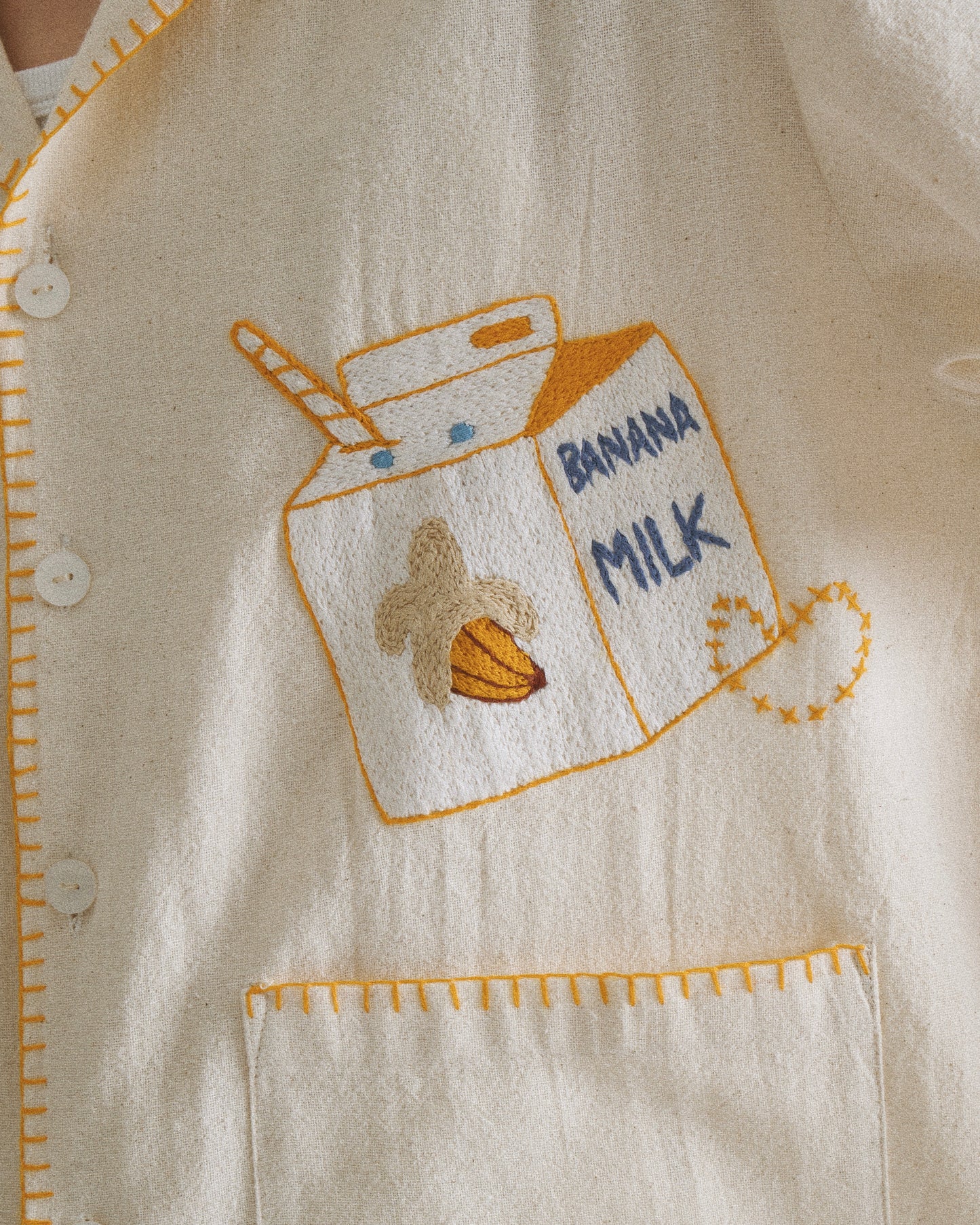Pickle Projects—Banana milk hand-embroidered S/S SHIRT